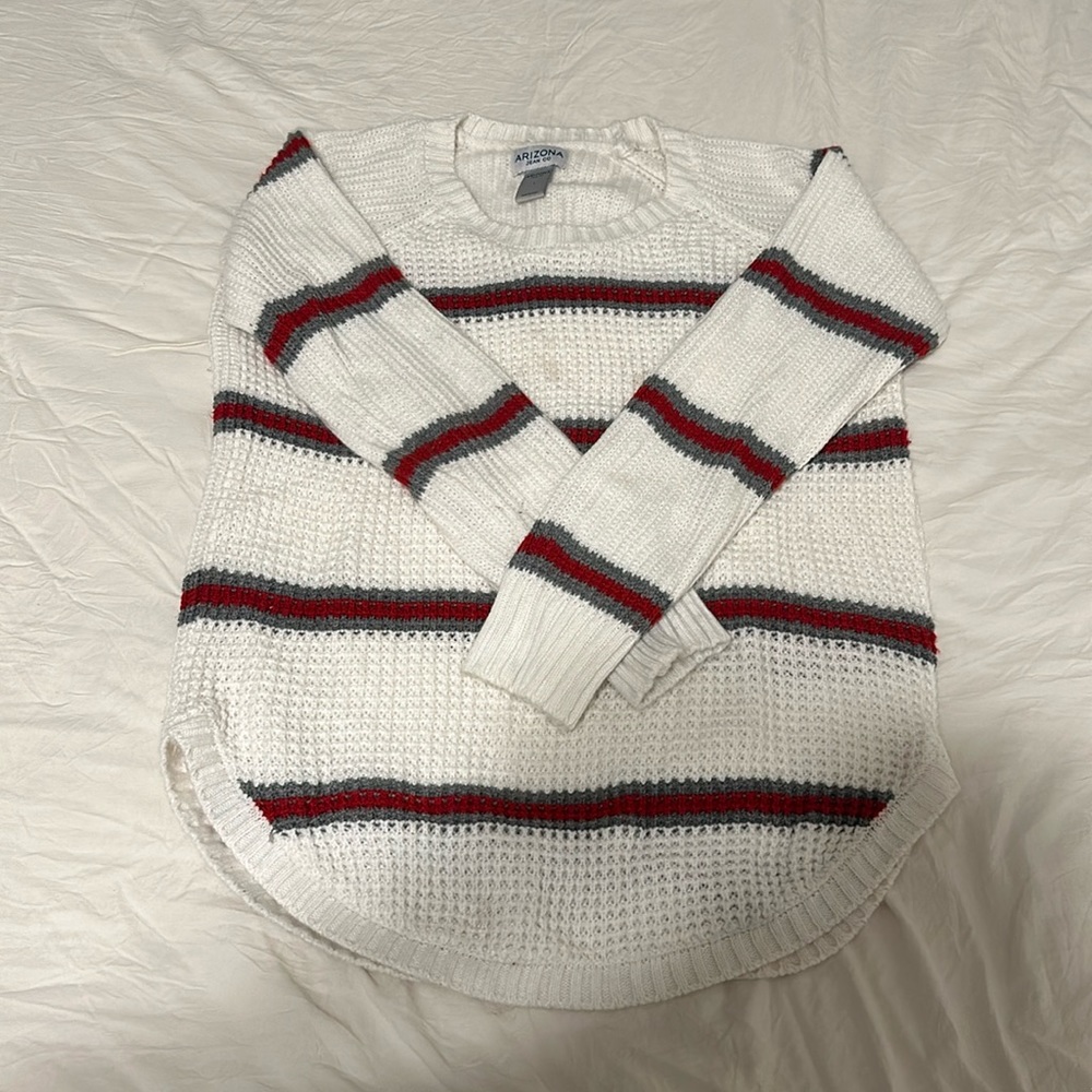 White Sweater with Red/Grey Stripes.